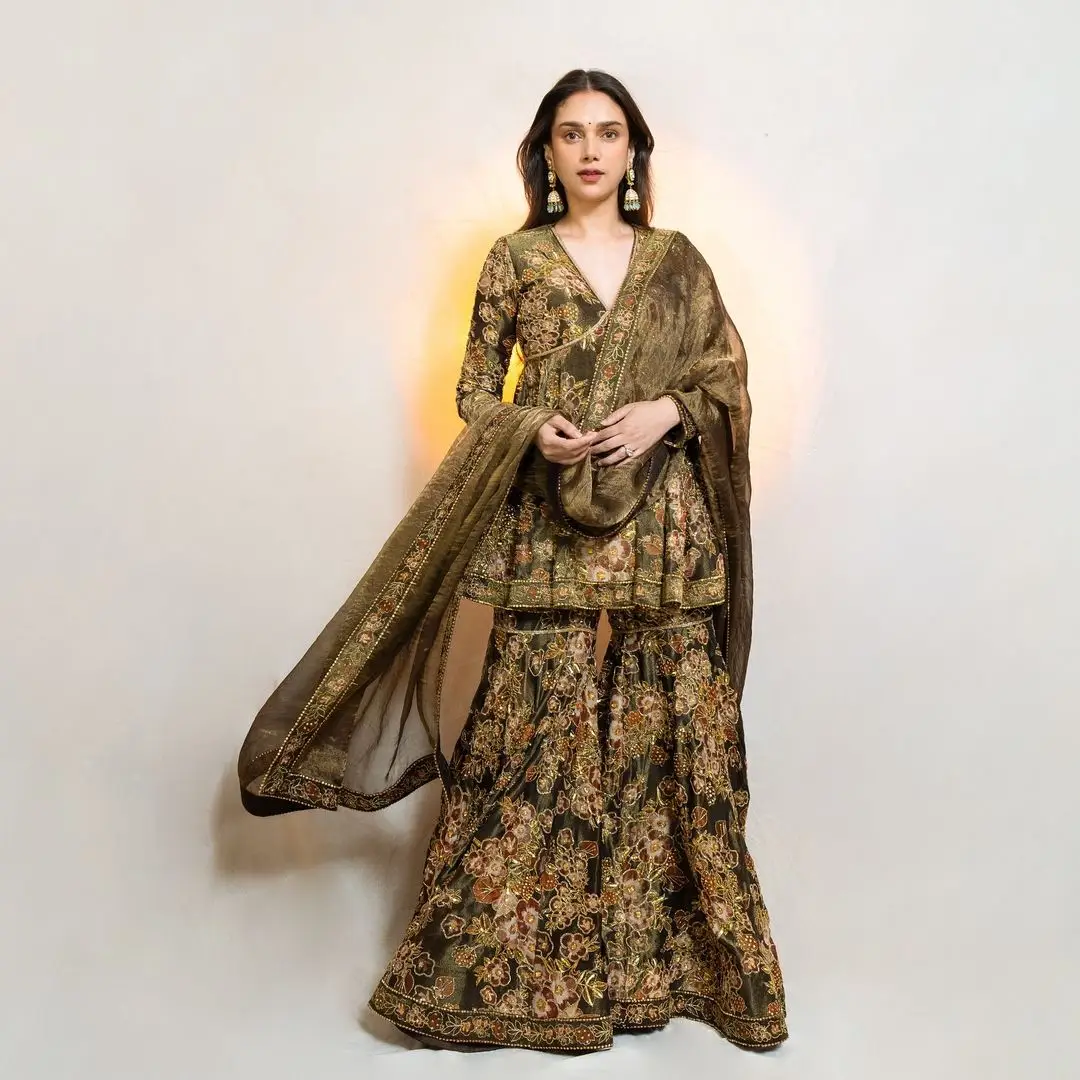 Hindi Actress Aditi Rao Hydari Stills In Green Designer Gown